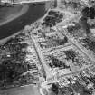 Kirkcudbright, general view, showing High Street and MacLellan's Castle.  Oblique aerial photograph taken facing north-east.