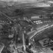 Glasgow, general view, showing Brownlee and Co. City Saw Mills, Port Dundas and Cowlairs Park.  Oblique aerial photograph taken facing north-east.