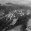 New Lanark, general view, showing Gourock Ropework Co. Ltd. Mills and New Lanark Road.  Oblique aerial photograph taken facing east.
