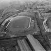 Carntyne Greyhound Racecourse, Myreside Street, Glasgow.  Oblique aerial photograph taken facing north-west.
