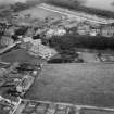Elie, general view, showing The Toft and Woodside Road.  Oblique aerial photograph taken facing north.  This image has been produced from a damaged negative.