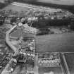 Elie, general view, showing The Toft and Woodside Road.  Oblique aerial photograph taken facing north.