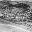 Carnoustie, general view, showing High Street and Carnoustie House Grounds.  Oblique aerial photograph taken facing north-west.