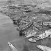 Clydebank, general view, showing Forth and Clyde Canal and John Brown's Shipyard, Queen Mary under construction.  Oblique aerial photograph taken facing north.
