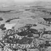 Kilmacolm, general view, showing Hydropathic Establishment and West Glen Road.  Oblique aerial photograph taken facing north.