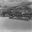 Ardrossan, general view, showing Ardrossan Refinery and South Crescent Road.  Oblique aerial photograph taken facing east.