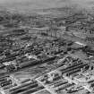 Glasgow, general view, showing Meadowside Granary and Upper Clyde Shipbuilding Yard.  Oblique aerial photograph taken facing north.