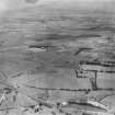 Airdrie, general view, showing Burnhead Quarry.  Oblique aerial photograph taken facing north-west.