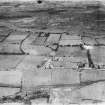 Plains, general view, showing Meadowhead Road and Airdrie Road.  Oblique aerial photograph taken facing north.  This image has been produced from a damaged negative.