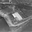 Former Ardrossan Dry Dock and Shipbuilding Co. Inches Yard, Ardrossan.  Oblique aerial photograph taken facing north.