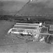 Henry Wiggin and Co. Mond Nickel Zenith Works, Boydstone Road, Glasgow.  Oblique aerial photograph taken facing east.