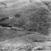 Glenapp Estate, general view, showing Auchencrosh Hill and Round Wood.  Oblique aerial photograph taken facing east.