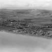 Girvan, general view, showing Stair Park and Victory Park.  Oblique aerial photograph taken facing east.