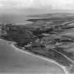 Turnberry, general view, showing Turnberry Hotel and Golf Course.  Oblique aerial photograph taken facing north.  This image has been produced from a damaged negative.