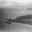 Turnberry Lighthouse and Turnberry Bay.  Oblique aerial photograph taken facing north.  This image has been produced from a damaged negative.