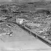 Kilmarnock, general view, showing Blackwood Morton and Sons Ltd. Burnside Works and Holmquarry Road.  Oblique aerial photograph taken facing east.