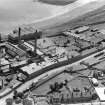 William Haig and Sons Guardbridge Paper Co. Paper Mill, Main Street, Guardbridge.  Oblique aerial photograph taken facing south.