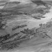 Thomas Ward and Sons Shipbreaking Yard, Inverkeithing.  Oblique aerial photograph taken facing east.