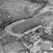 Powderhall Stadium, Powderhall Road, Beaverbank, Edinburgh.  Oblique aerial photograph taken facing north-east.