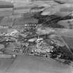 Tullis Russell and Co. Paper Mill, Glenrothes.  Oblique aerial photograph taken facing north. Auchmuty Mill, left, Rothes Bleachfield ('E' shaped building with range to east) bottom, Power Station top and Rothes Mill on right.