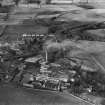 Tullis Russell and Co. Paper Mill, Glenrothes.  Oblique aerial photograph taken facing north.  This image has been produced from a damaged negative.