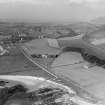 West Kilbride, general view, showing Chapelton Farm and Ardrossan Road.  Oblique aerial photograph taken facing north.