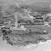 Fraserburgh, general view, showing Kinnaird Head Lighthouse and Denmark Street.  Oblique aerial photograph taken facing south-west.
