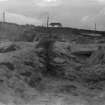 Excavation photograph: Junction between house 2 ( left ) and house 1 ( right ) from W.
Copy negative 1995. Original print in Print Room.