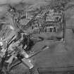 Tullis Russell and Co. Paper Mill, Glenrothes.  Oblique aerial photograph taken facing east. Auchmuty Mill, bottom left, Rothes Bleachfield (mid right) , Rothes Mill (top right) and power house (top left)