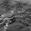 Tullis Russell and Co. Paper Mill, Glenrothes.  Oblique aerial photograph taken facing north-east. Auchmuty mill (bottom left), Rothes Bleachfield (bottom right), power house (top) and Rothes Mill (top right)