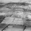 Kirkton Housing Estate, Dundee, under construction.  Oblique aerial photograph taken facing north.