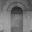 S porch, inner end, detail of Romanesque doorway with nookshafts and cushion capitals.