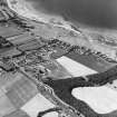 Longniddry, general view, showing Longniddry Golf Course and Main Street.  Oblique aerial photograph taken facing west.