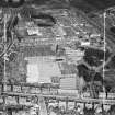 Ballantyne Brothers and Co. Ltd. March Street Mills, Peebles.  Oblique aerial photograph taken facing north.  This image has been produced from a crop marked negative.