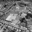 Ballantyne Brothers and Co. Ltd. March Street Mills, Peebles.  Oblique aerial photograph taken facing north-west.  This image has been produced from a crop marked negative.