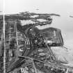 Shell Refining Co. Ltd. Ardrossan Refinery and Ardrossan Harbour.  Oblique aerial photograph taken facing south-west.  This image has been produced from a crop marked negative.