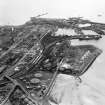 Shell Refining Co. Ltd. Ardrossan Refinery and Ardrossan Harbour.  Oblique aerial photograph taken facing south.