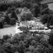 Knockespock House, Clatt.  Oblique aerial photograph taken facing south.  This image has been produced from a crop marked negative.