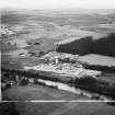 A and G Paterson Ltd. Silverbank Saw Mills, Banchory.  Oblique aerial photograph taken facing north-west.  This image has been produced from a crop marked negative.