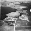 A and G Paterson Ltd. Silverbank Saw Mills, Banchory.  Oblique aerial photograph taken facing east.  This image has been produced from a crop marked negative.