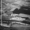 A and G Paterson Ltd. Silverbank Saw Mills, Banchory.  Oblique aerial photograph taken facing north.  This image has been produced from a crop marked negative.