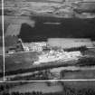 A and G Paterson Ltd. Silverbank Saw Mills, Banchory.  Oblique aerial photograph taken facing north.  This image has been produced from a crop marked negative.