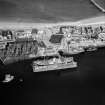 Dry Dock, Pocra Quay and Alexander Hall and Co. Ltd Shipyards, Aberdeen Harbour.  Oblique aerial photograph taken facing east.