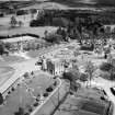 Huntly Arms Hotel, Charlestown Road and War Memorial Buildings, Ballater Road, Aboyne.  Oblique aerial photograph taken facing north.  This image has been produced from a crop marked negative.
