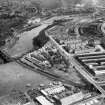 Aberdeen, general view, showing A and G Paterson Ltd. Craiginches Saw Mills and Wellington Road.  Oblique aerial photograph taken facing north.