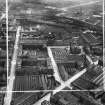 Glasgow, general view, showing David and John Anderson Ltd. Atlantic Mills, Walkinshaw Street and Bernard Street.  Oblique aerial photograph taken facing east.  This image has been produced from a crop marked negative.
