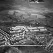 Motherwell, general view, showing Newton Victor Ltd. Works, Watling Street and Chesters Crescent.  Oblique aerial photograph taken facing north-east.  This image has been produced from a damaged and crop marked negative.