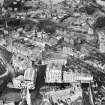 Oban, general view, showing Royal Hotel, Argyll Square and McCaig's Tower.  Oblique aerial photograph taken facing north-east.