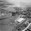 Glasgow, general view, showing Hoover (Electric Motors) Ltd. Cambuslang Works, Somervell Street and Cambuslang Bridge.  Oblique aerial photograph taken facing east.