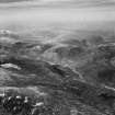 Loch na Caoidhe and Sgurr Coire nan Eun, Strathconon Forest.  Oblique aerial photograph taken facing north-west.